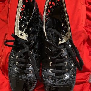 CHANEL CAMELLIA CUT OUT HIGH TOP SNEAKERS